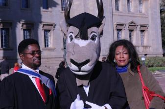 Charming family poses with the Wits Kudu at the Health Sciences graduation this morning. Photo: Tendai Dube